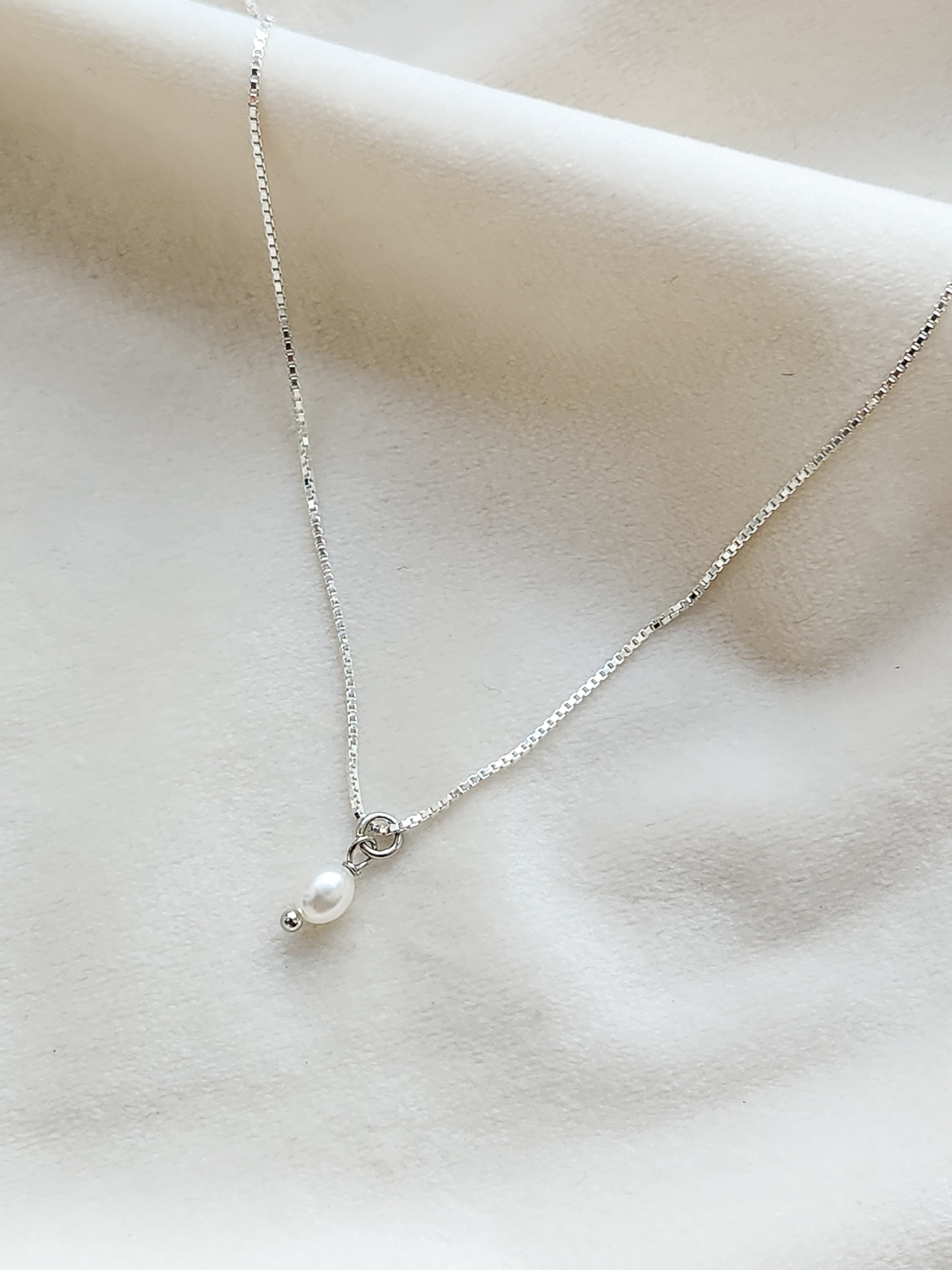 Collar de una perla blanca NECSP02