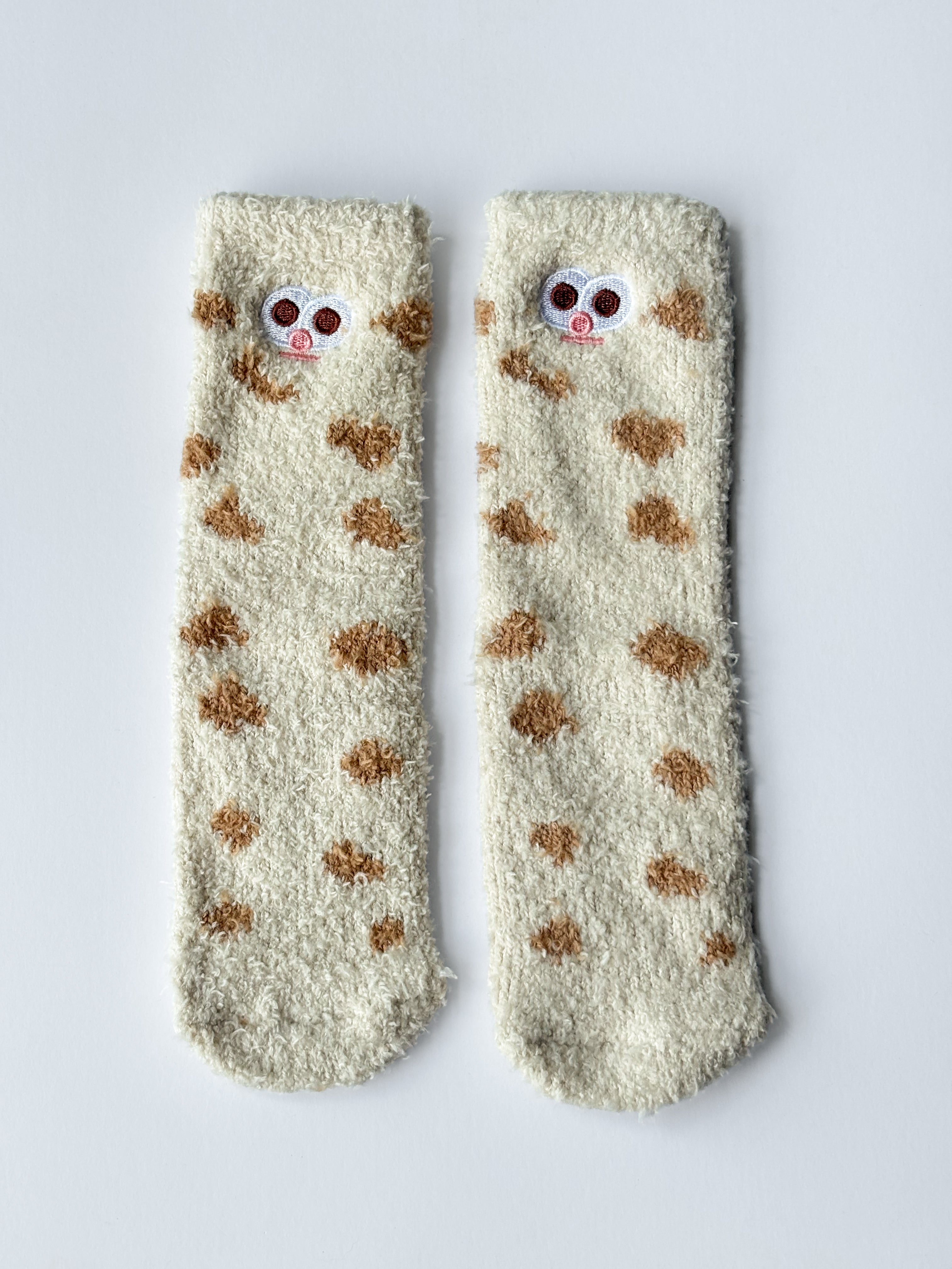 Calcetines peludos con lunares y caritas sonrientes S0760020ASST