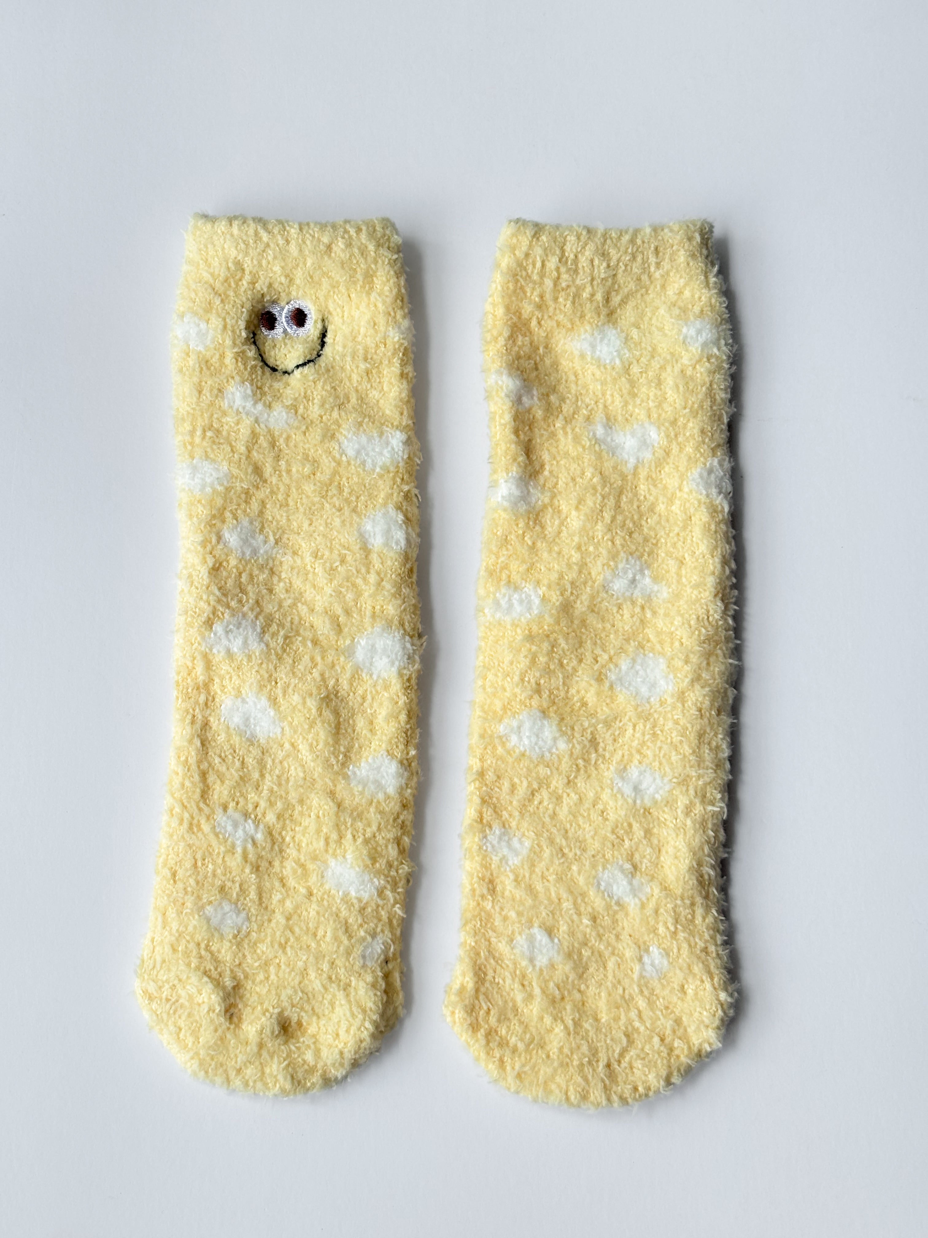 Calcetines peludos con lunares y caritas sonrientes S0760020ASST