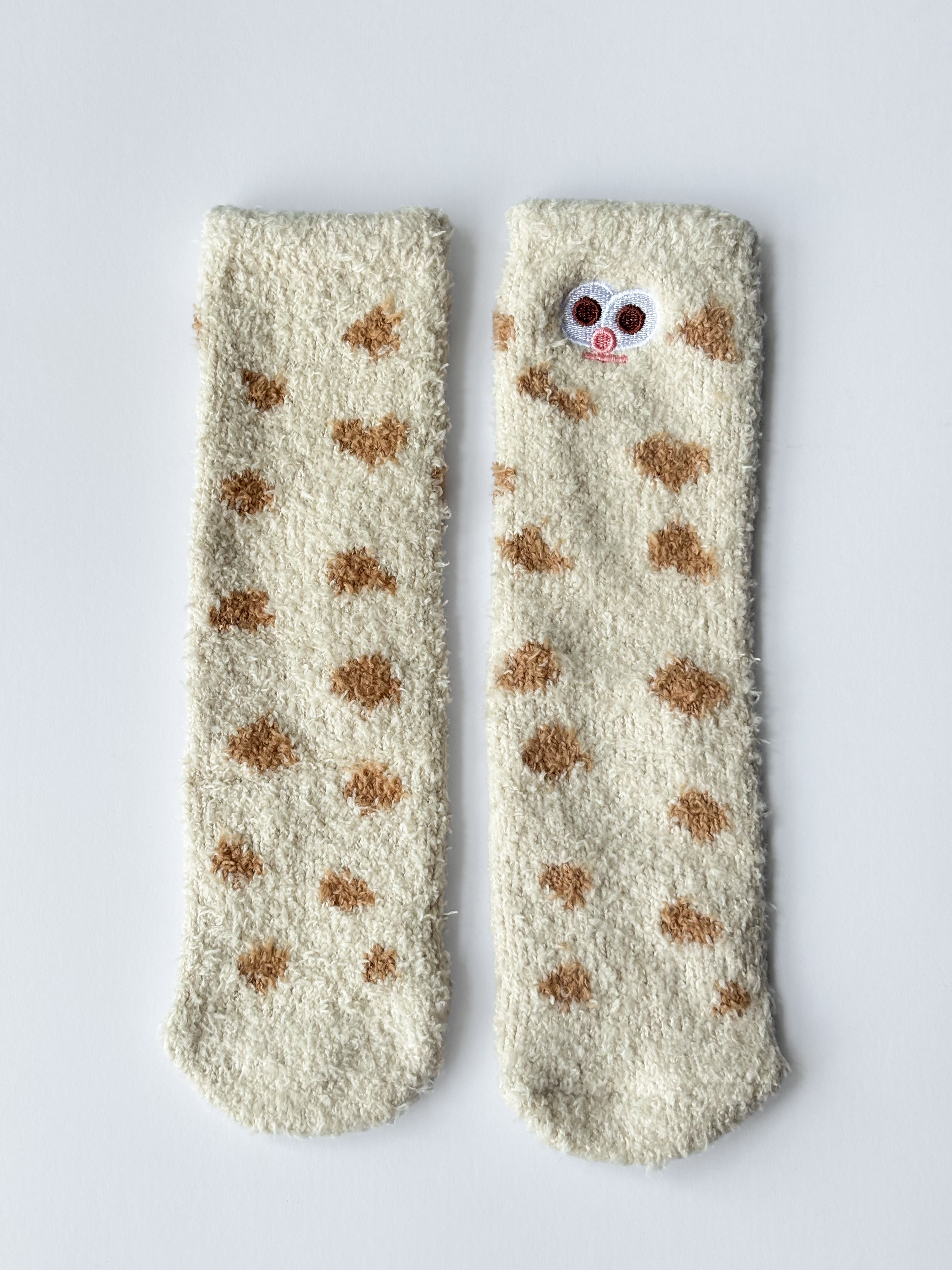 Calcetines peludos con lunares y caritas sonrientes S0760020ASST