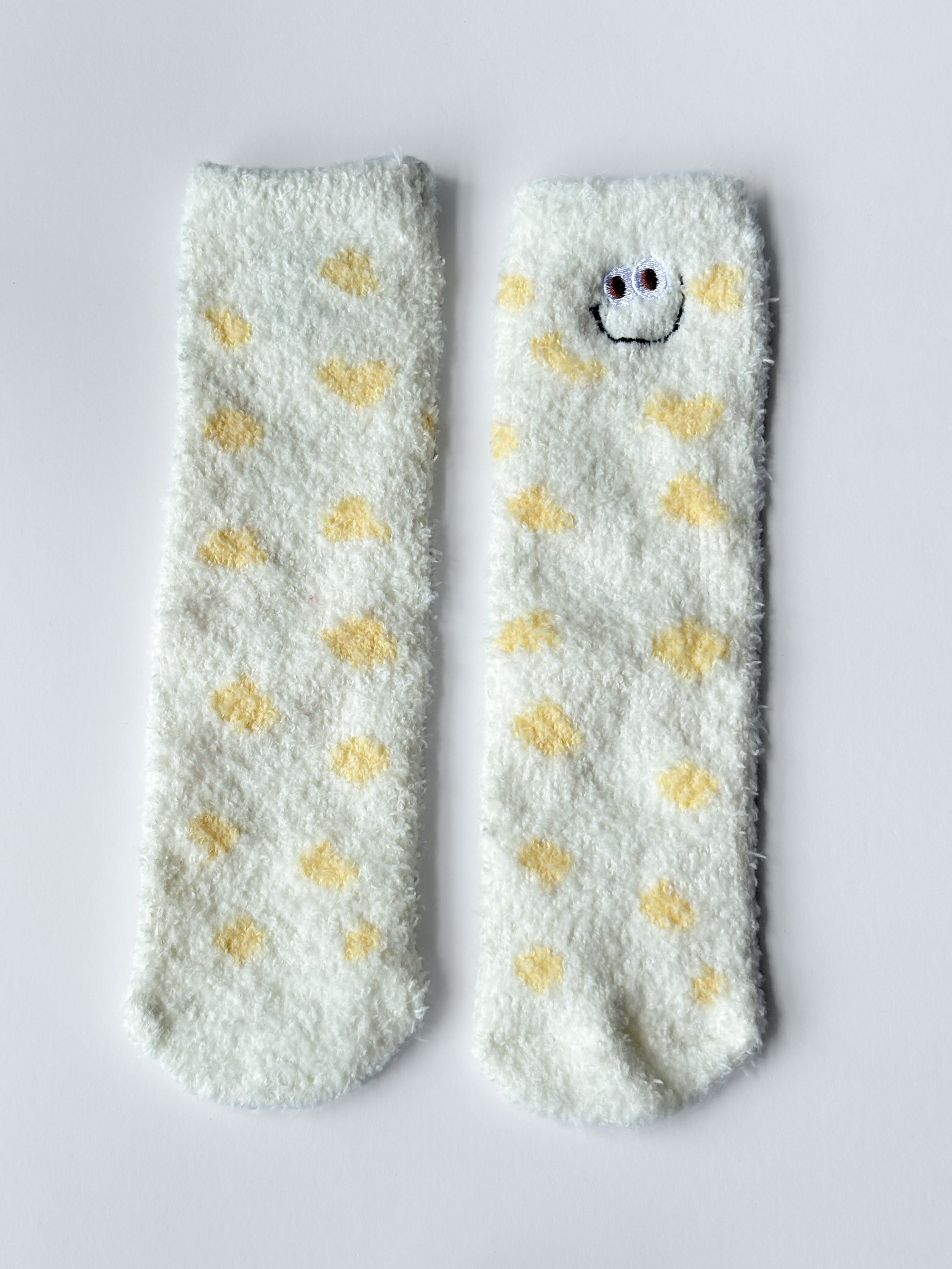 Calcetines peludos con lunares y caritas sonrientes S0760020ASST
