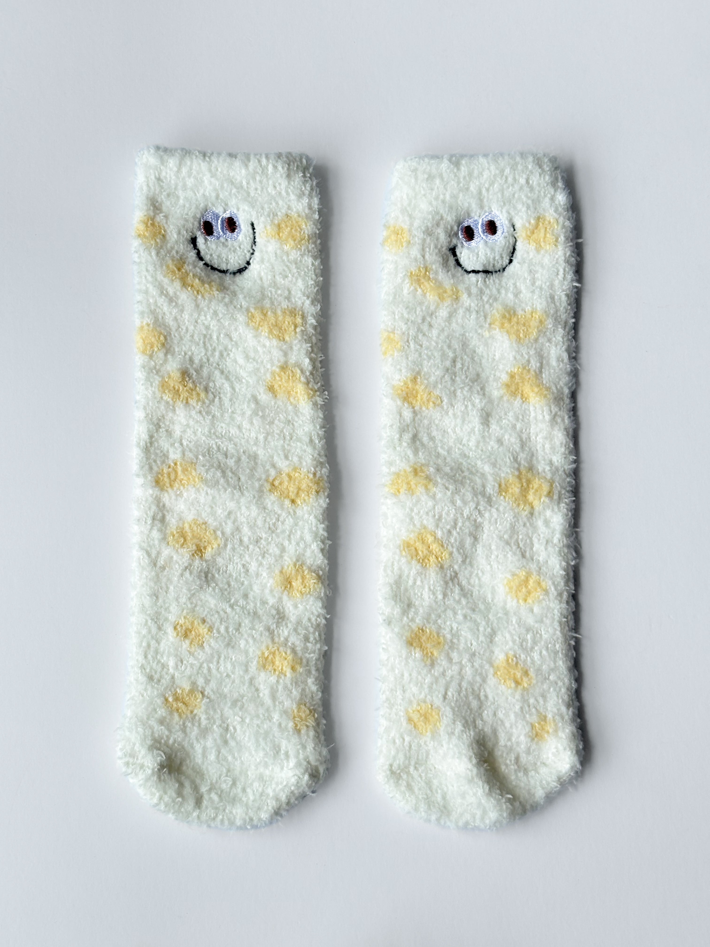 Calcetines peludos con lunares y caritas sonrientes S0760020ASST